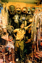 'Jua Kali', curio vendor with curios. Nairobi, Kenya, 1994.