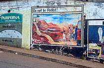Street painting warning about modern-day human trafficking. Freetown, Sierra Leone, 2004-2005.