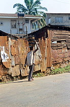 Charcoal vendor on street, Freetown, Sierra Leone, 2004-2005.
