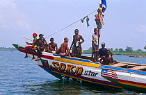 People aboard passenger and cargo boat. Port Loko, Sierra Leone, 2004-2005.