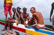 Passengers aboard cargo service to Port Loko. Sierra Leone, 2004-2005.