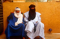 Tuareg cattle owners in traditional dress visiting Niamey, Niger, 2003.