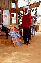 Man at hair salon in Niamey, Niger, 2003.
