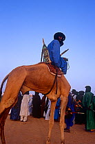 Camel rider at traditional Peul / Fula ceremony, Ngarawal Fuduk, near Agadez, Niger, 2005.