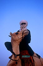 Camel rider at traditional Peul / Fula ceremony, Ngarawal Fuduk, near Agadez, Niger, 2005.