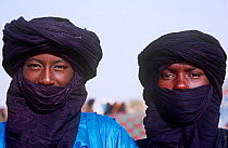 Portrait of two Peul / Fula men with faces partially covered at Ngarawal Fuduk near Agadez, Niger, 2005.