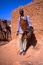 Portrait of street vendor outside building, Mirriah, southern Niger, 2005.