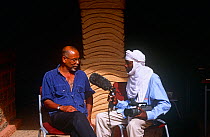 Photographer / film-maker Steve Taylor interviewing local man in Agadez, Niger, 2005.