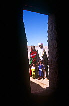 Bede, a Toubou guide, with wife and children, in Sigadine, Niger, 2005.