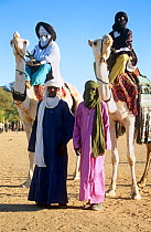 Tuareg camel riders in traditional dress at the Iferouane festival, central Niger, 2005.