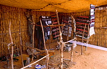 Weaver's looms and traditional Peul / Fula fabrics. National Museum, Naiamey, Niger, 2004.