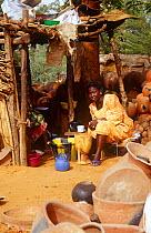 Local woman at pottery market, Niamey, Niger, 2004.