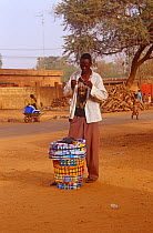 Street vendor with Osama bin Laden t- shirt, Niger, 2003.