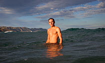William Trubridge, a world champion free diver who is campaigning to protect the Critically Endangered Maui's dolphin (Cephalorhynchus hectori maui) endemic to New Zealand. December 2012.  Editorial u...