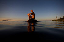 William Trubridge, a world champion free diver who is campaigning to protect the Critically Endangered Maui's dolphin (Cephalorhynchus hectori maui) endemic to New Zealand. January 2008.  Editorial us...