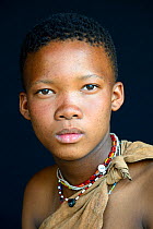 Portrait of young Naro San woman, Kalahari, Ghanzi region, Botswana, Africa. October 2014.
