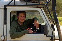Photographer Axel Gomille in Landrover, India, July 2012.