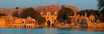 Panoramic of the city of Jaisalmer, nicknamed the Golden City, view of the fort from Gadisar Lake, Thar Desert, Rajasthan, India. February 2012.