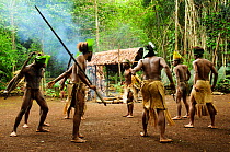Men in traditional costume during tribal dance. Efate Island, Shefa Province, Vanuatu, September 2008.