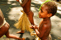 Boy in tradtional outfit during tribal dance, in a village, Tanna Island, Tafea, Vanuatu, September 2008