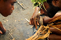 Demonstration of how to light a fire, Tanna Island, Tafea Province, Vanuatu, September 2008.