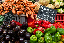 Vegetables including peppers, aubergines, carrots and celery at market at Aix en Provence, France, October.
