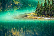 Green waters of Emerald Lake, near Carcross, Yukon Territories, Canada, September 2013.