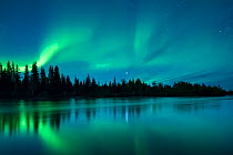 Aurora Borealis (Northern Lights) over the Klondike River, Yukon Territories, Canada, September 2013.