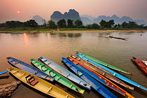 Canoes on the moored on the  Nam Song River at Vang Vieng, Laos, March 2009.