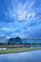 Dawn over the mountains and Nam Song River at Vang Vieng, Laos, March 2009.