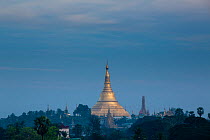 Shwedagon Pagoda in distance, Yangon, Myanmar. November 2012.