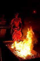 Man firewalking during festival, Kandy, Sri Lanka, December 2012.