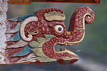 Figure of a dragon on the wall of a temple, Jiajinshan Mountain, Maerkang county, Sichuan Province, China.