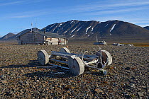 Wooden cart used to transport seals outside hut of trapper. Spitzberg, Svalbard, Norway, August 2014.