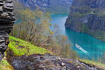 View from behind one of the Seven Sisters waterfalls, before falling into the Geirangerfjorden. Norway, May 2012.