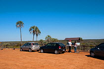 Tourists looking at information signs, El palmar National Park , Entre Rios Province, Argentina, August 2009.