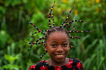 Portrait of local girl, Mbomo Village, Odzala-Kokoua National Park, Republic of Congo (Congo-Brazzaville), Africa, May 2013.