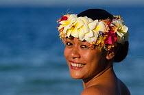 Woman wearing traditional floral headdress for ceremony, Kioa Island, Fiji, South Pacific, July 2014.