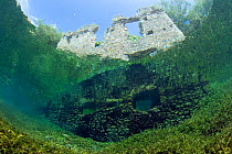 Partly submerged ruins viewed through Snell's window, Lago di Capo D'Acqua, Capestrano, Aquila, Abruzzo, Italy, May 2006.
