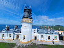 Sumburgh Head Lighthouse and RSPB visitor centre, Sumburgh Head, Shetland, UK, June 2014.