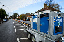 Mobile pump used to pump floodwater from River Thames away from houses, Chertsey, Surrey, UK, February 2014.