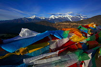 Prayer flags, Mount Kawakarpo, Meili Snow Mountain National Park, Qinghai-Tibet Plateau, Yunnan Province, China. November 2009