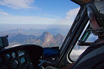 Aerial of Mount Namuli taken from within helicopter, Mount Namuli, Mozambique, May 2011.
