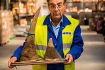 Man with mounted rhino horns confiscated by the Spanish police at Adolfo Suarez Madrid-Barajas Airport in accordance with CITES, stored in a government warehouse, Spain, October 2014.