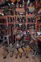 Interior of a toursit shop in Addis Ababa featuring various items such as Coptic crosses, headrests wooden chairs, wooden bowls and various wood carvings which the seller claimed to be antique. Addis...