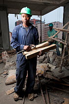 Economic migrants from rural areas working on construction site, Nairobi, Kenya, November 2013.