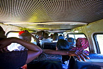 View from the back of a Matatu mini van taxi, Kenya. February 2013.