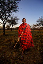 Maasai man with spear, Mara region, Kenya, September 2013.