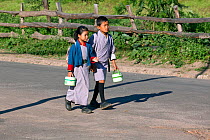 Children on the way to school, town of Punakha. Bhutan, October 2014.