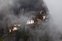 The Tiger's Nest Monastery on a rocky mountainside near the town of Paro. Bhutan, October 2014.